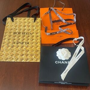 Designers gift bags ( Chanel , Hermes , Bottega)with accessories as shown